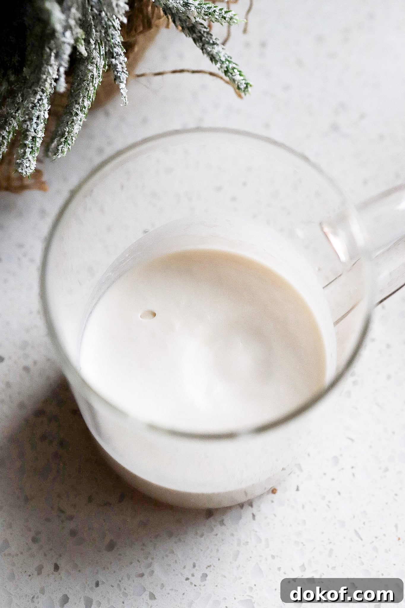 Starbucks-Style Sugar Cookie Cold Foam Recipe — Copycat Guide 4 Close up shot of heavy cream cold foam in glass cup.