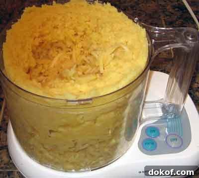 Quince are grated for greek spoon sweet recipe kythoni glyko.