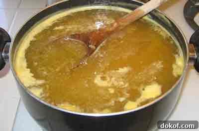 Boiling the quince for greek spoon sweet recipe kythoni glyko.
