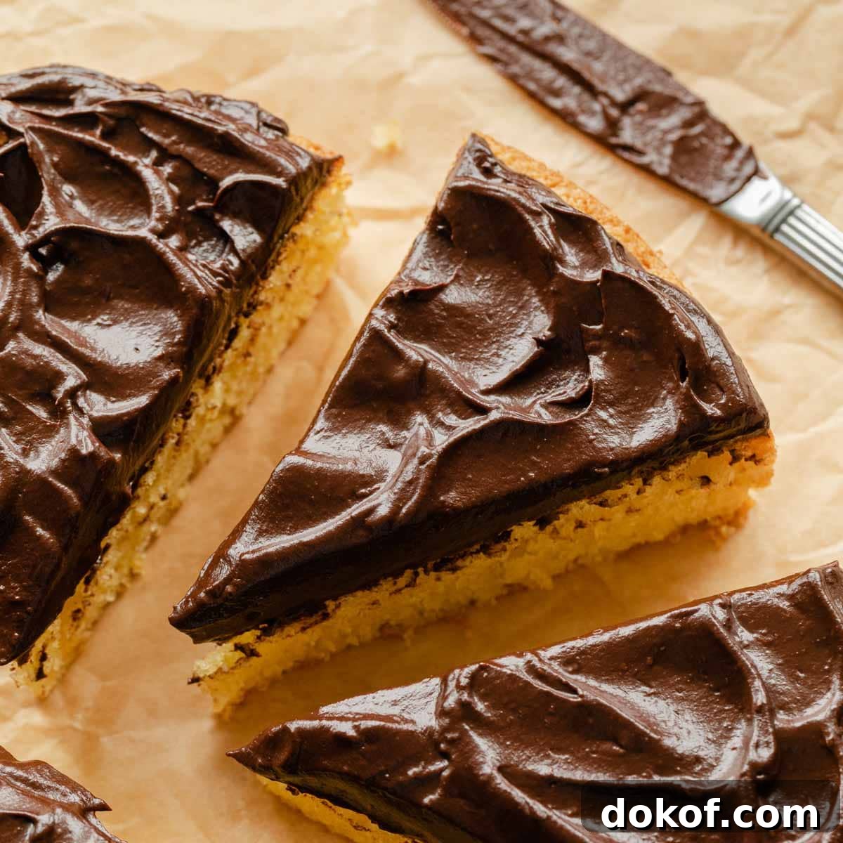 Slice of cake topped with chocolate avocado frosting.