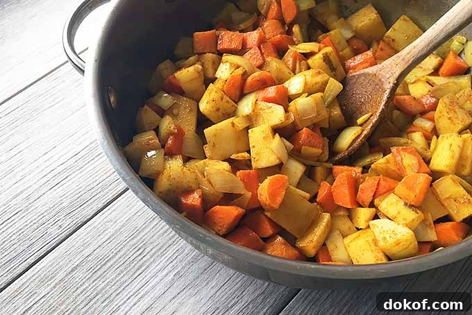 Stirring a Mixture of Vegetables in a Pan | Foodal.com