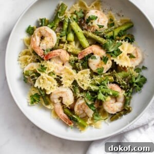 This easy healthy shrimp and asparagus pasta is deliciously lemony, fast, and uses only a handful of ingredients. Ready in 20 minutes!