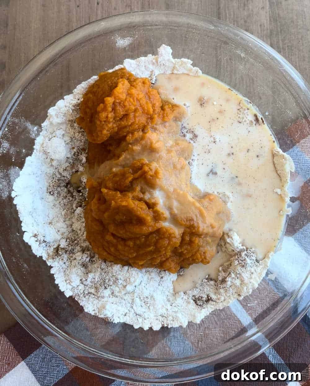 pumpkin puree and dry ingredients in mixing bowl.