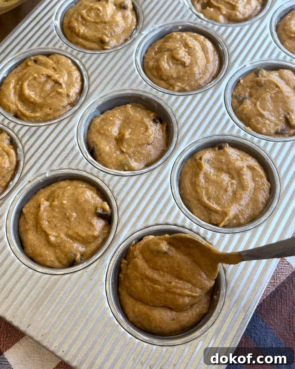 spoon batter into muffin pan.