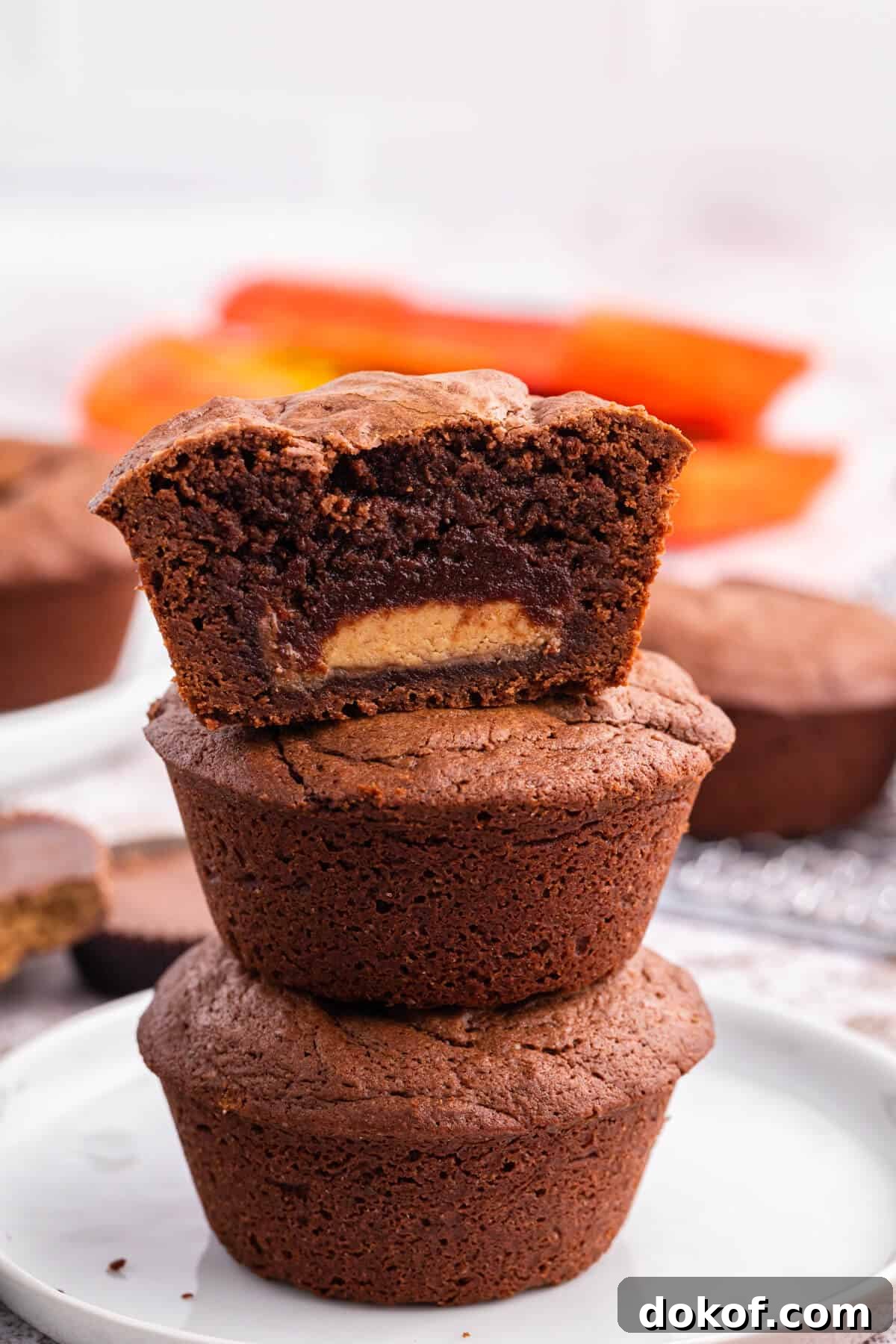 Reese’s Stuffed Brownies Recipe: Gooey Chocolate Peanut Butter Squares 4 A stack of Reese's stuffed brownies.