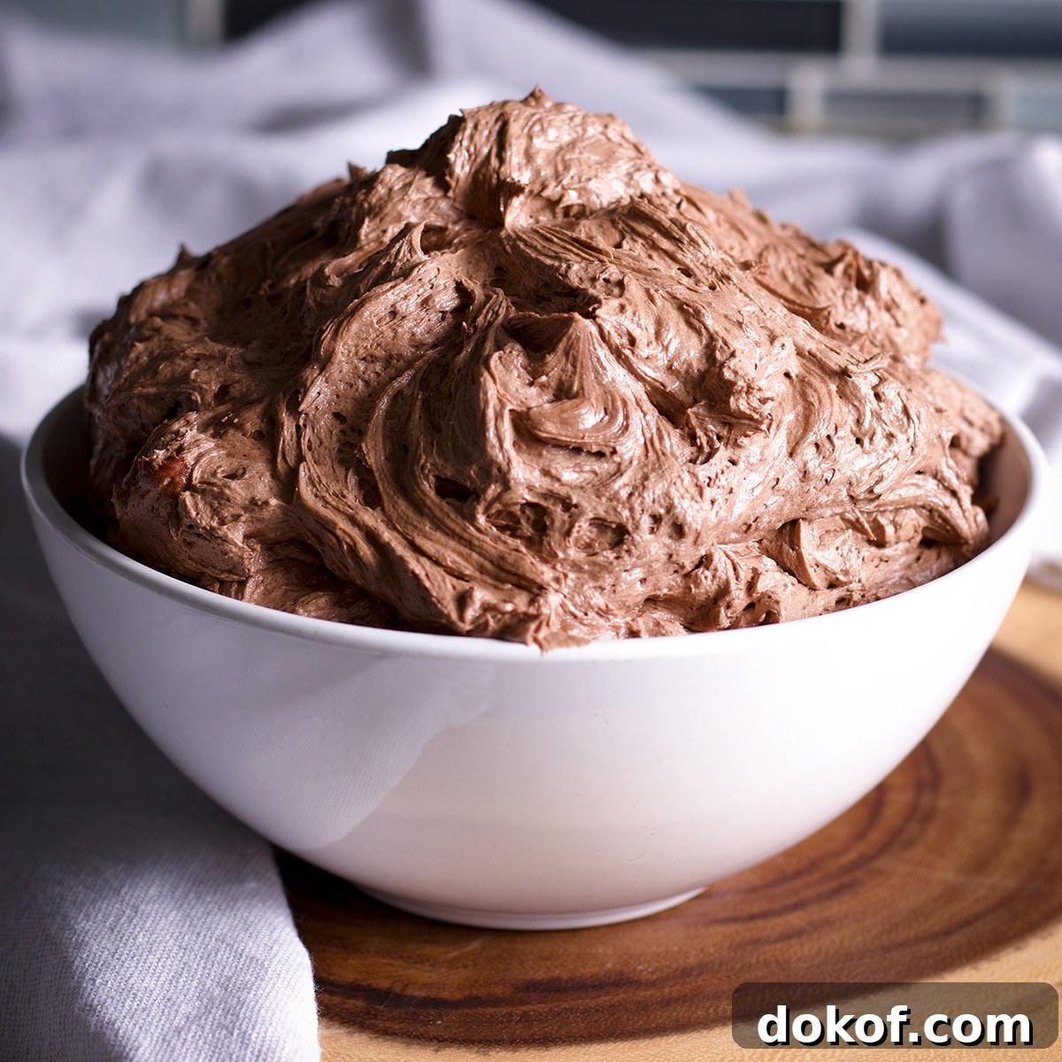 Quick Chocolate Buttercream Made with Heavy Cream 3 A bowl filled with quick chocolate buttercream.