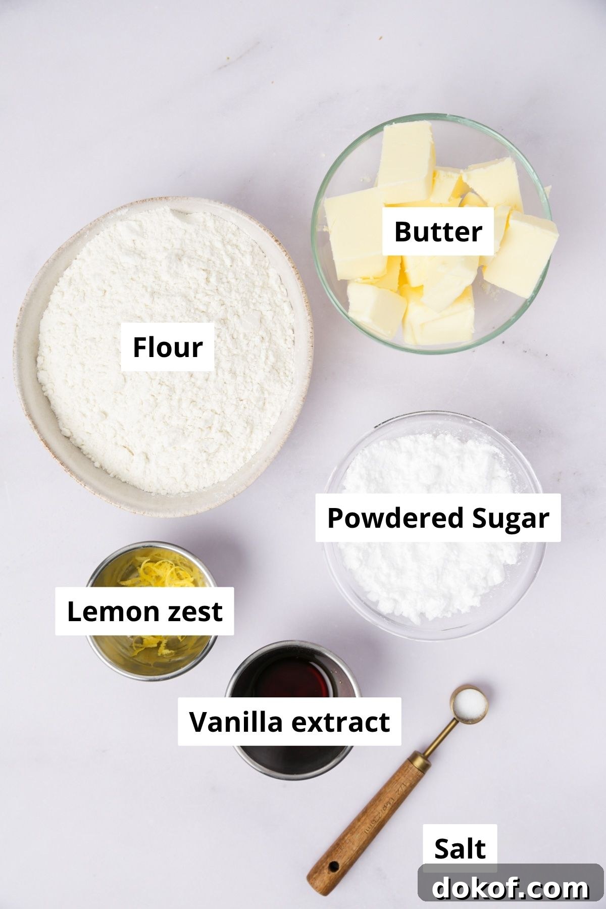 ingredients for lemon meringue pie cookies including butter, eggs, lemon curd, and sugar
