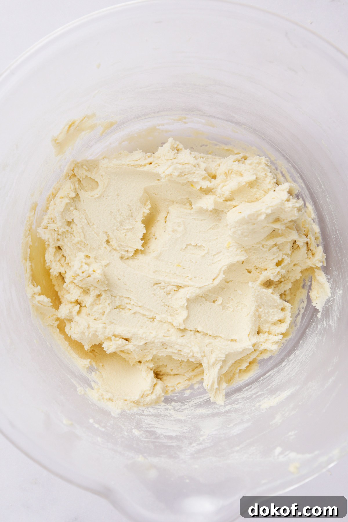 cookie dough for lemon curd cookies in a mixing bowl