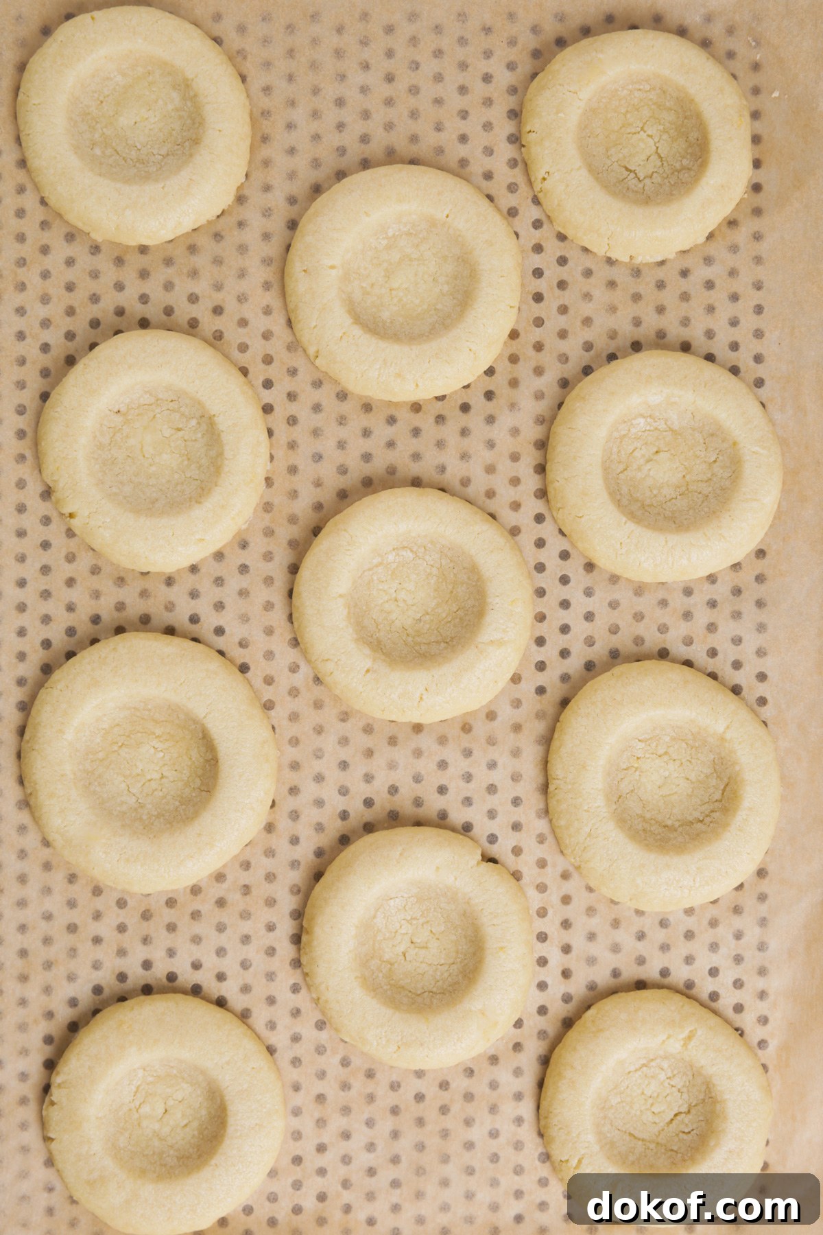 baked lemon thumbprint cookies with golden edges