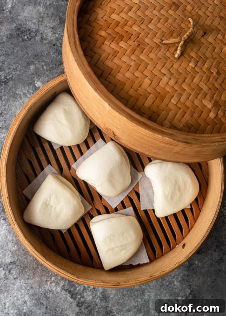 overhead: wooden steamer with steamed buns