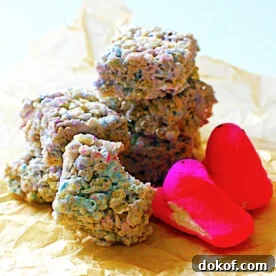 A pile of colorful rice krispie treats made with marshmallow peeps.