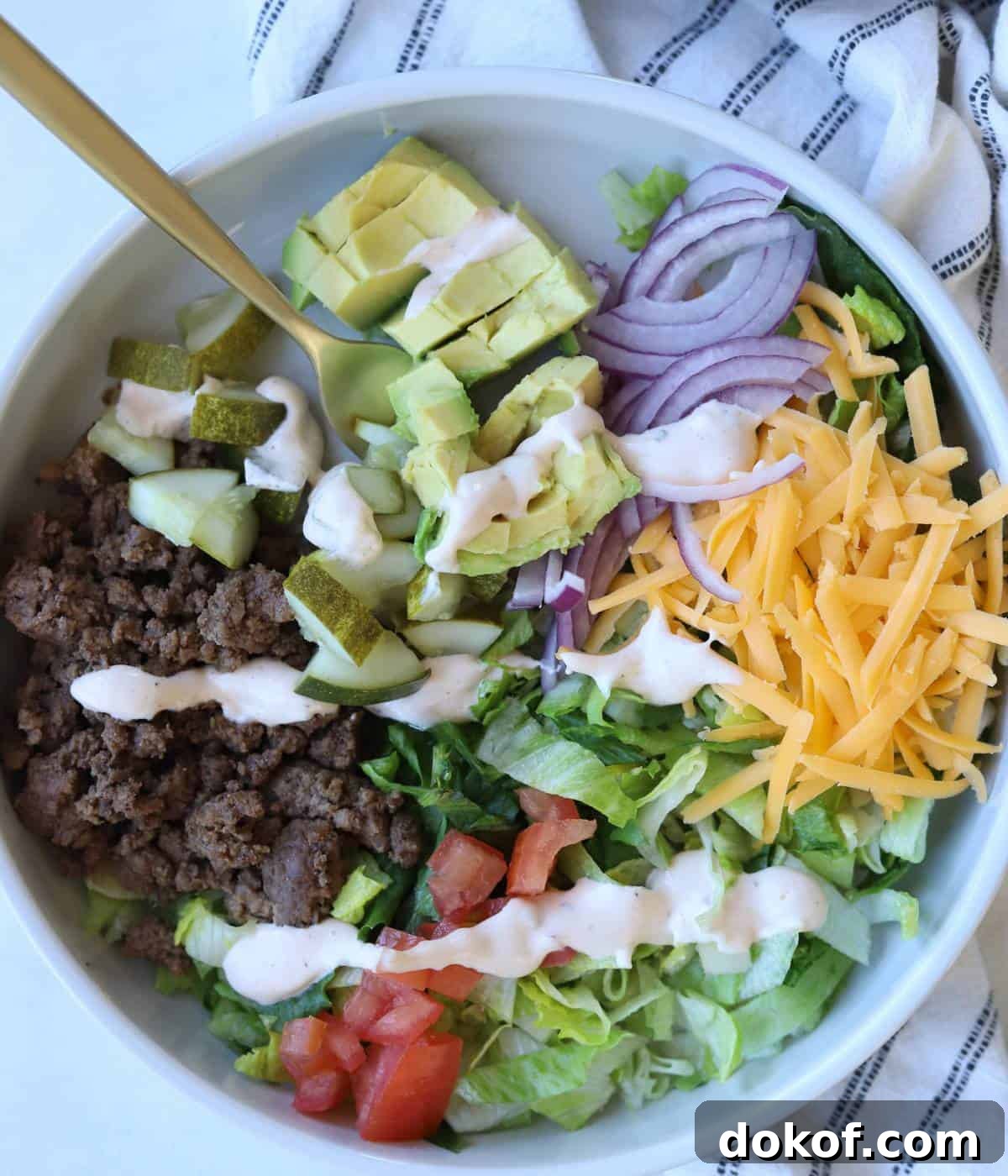 Cheeseburger bowls with ground beef, cheese, and veggies.
