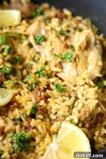 Chicken and chorizo paella in dutch oven.