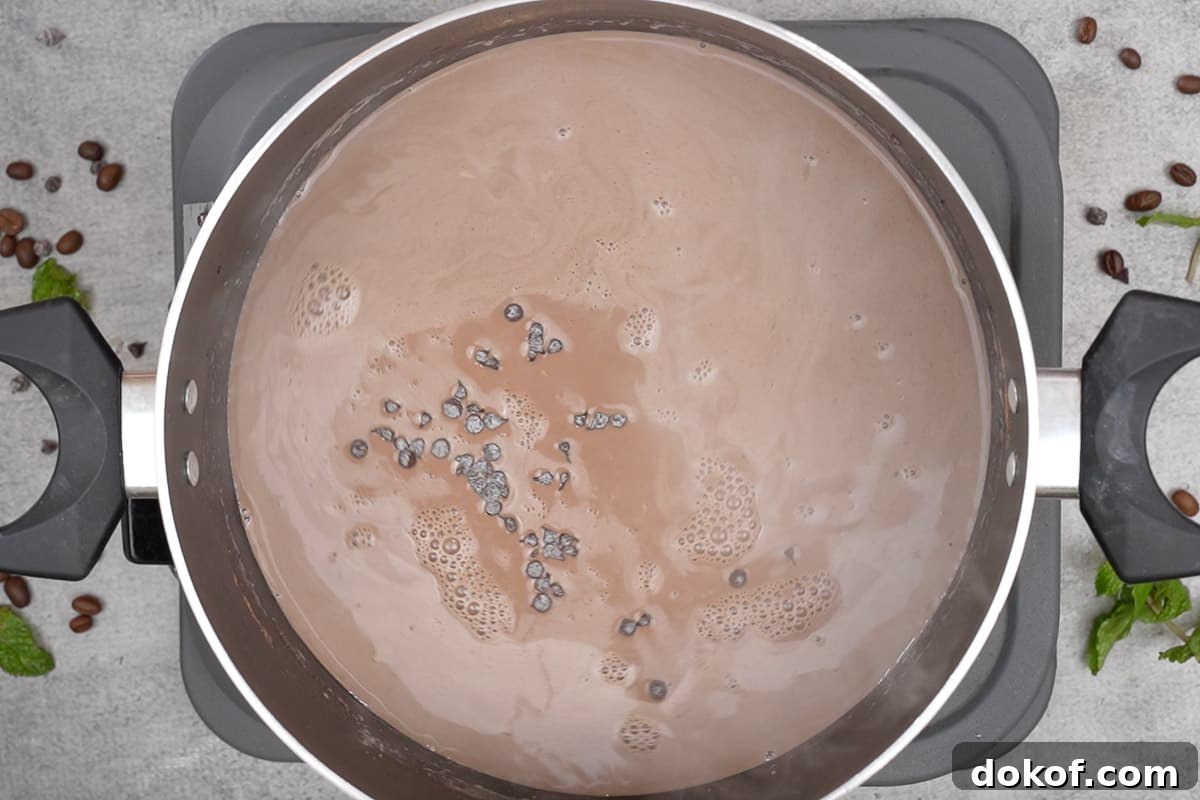Chocolate chips, vanilla and espresso added to the pan.