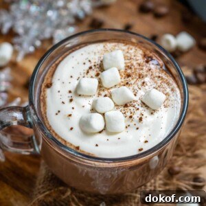 Espresso Hot Chocolate is your regular hot chocolate with a shot of coffee. Make this comforting drink this winter for some holiday cheer!
