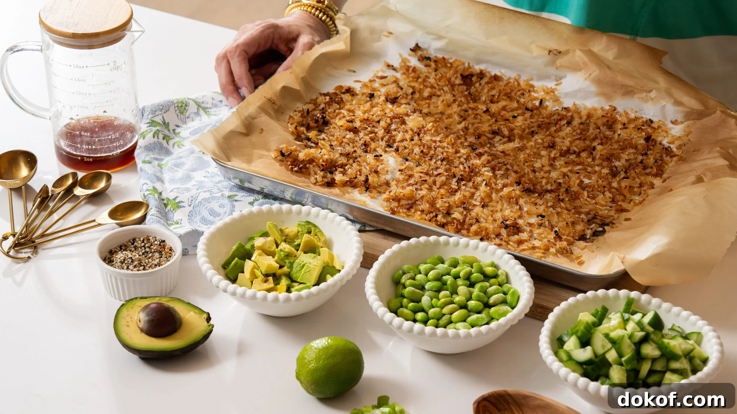 Crispy rice salad ingredients on a kitchen island.
