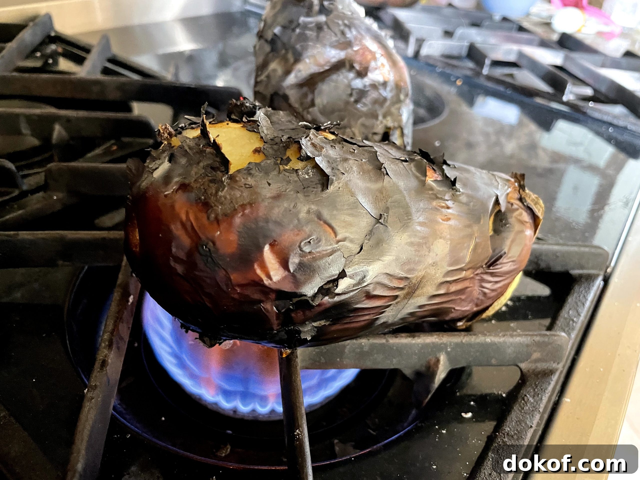 Gilling eggplant on gas stovetop