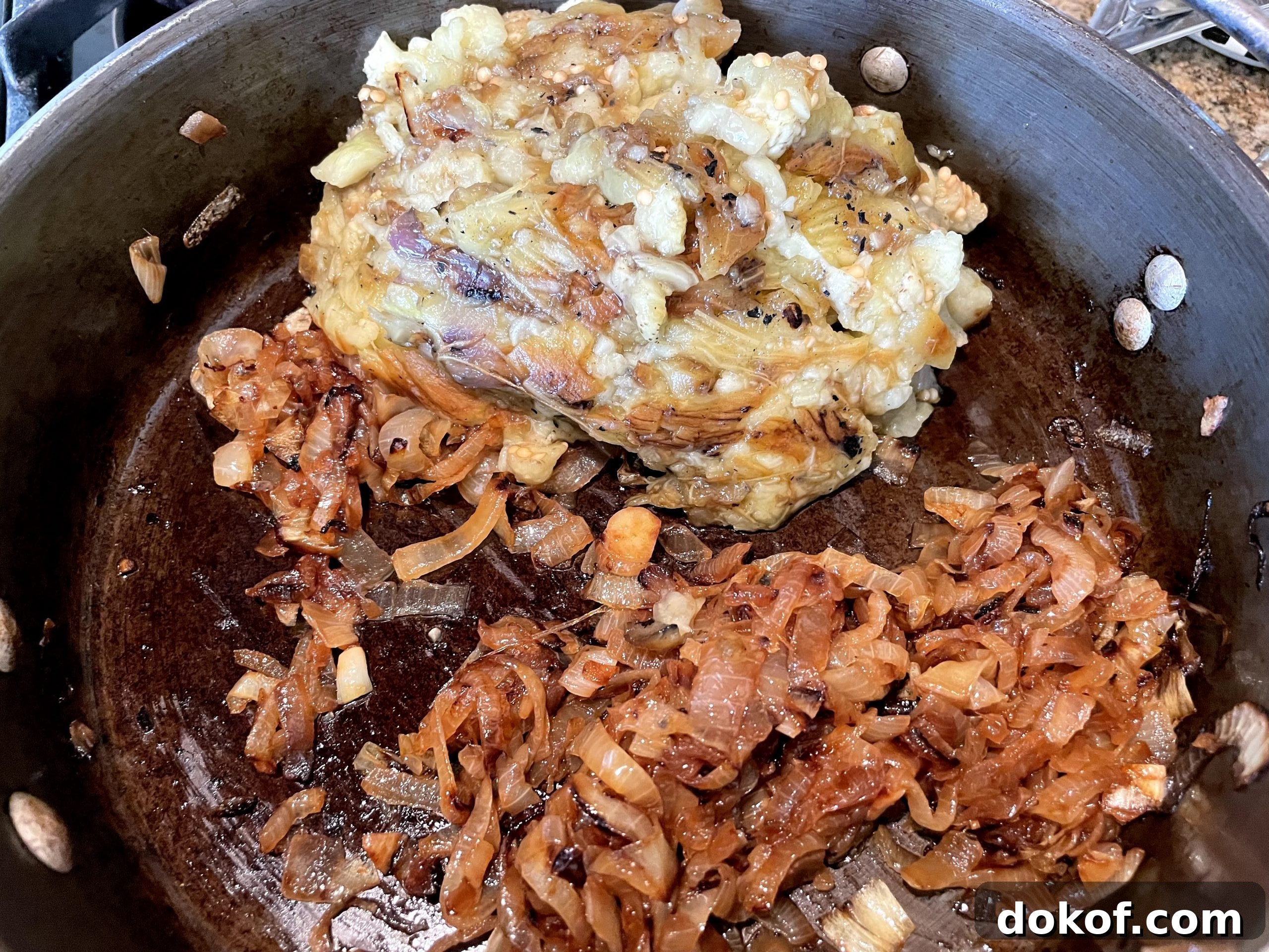 Add eggplant to cramelized onions.