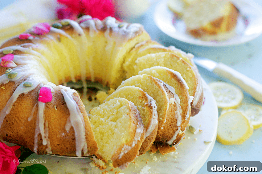 Classic Old-Fashioned Pound Cake Recipe: Step-by-Step Guide 9 pound cake in bundt shape sliced and kept on a white marble board
