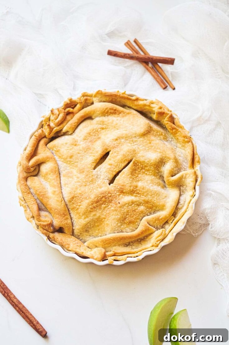 the completed air fryer apple pie on a countertop and ready to serve