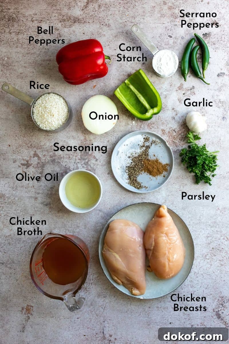 Ingredients needed to make this dish in small bowls and with fresh produce.