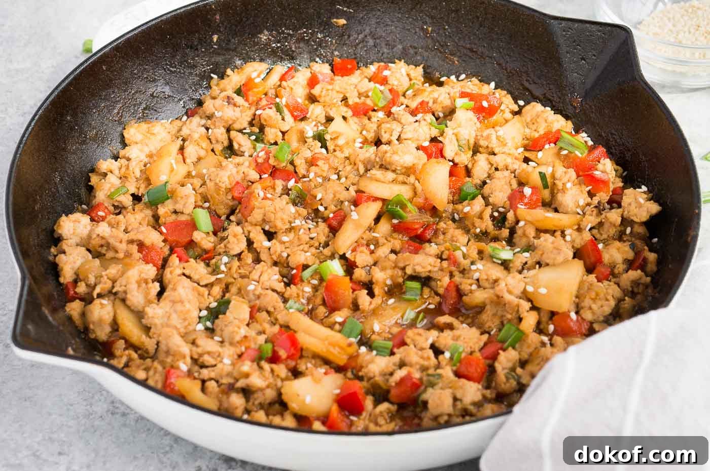 close up image of Asian chicken dish in skillet