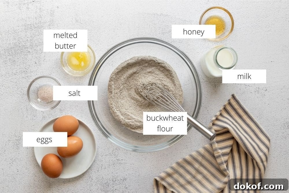 All of the ingredients for the buckwheat crepes recipe arranged on a work surface.