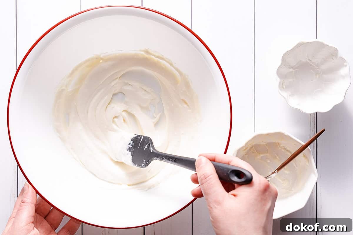 dressing being mixed in large bowl