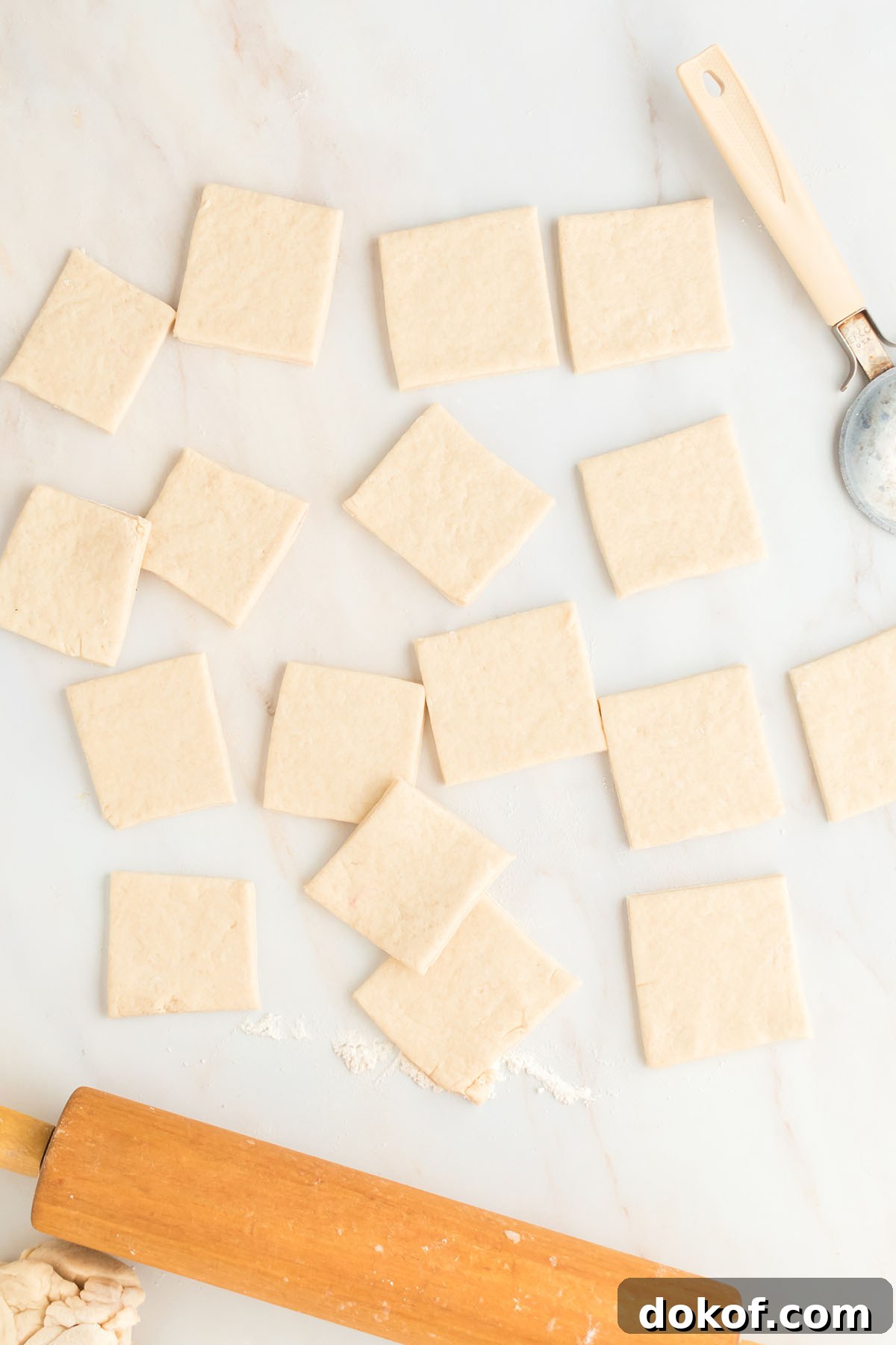 Sopapillas dough cut into squares.
