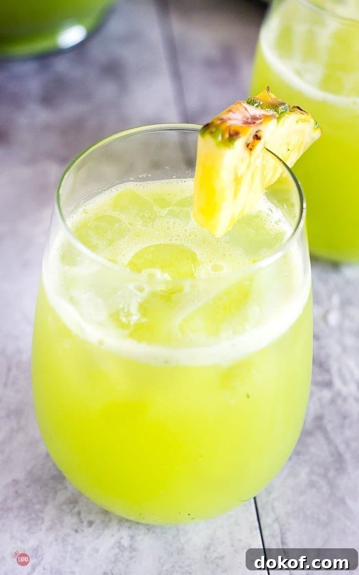 Pineapple Cucumber Rum Punch Recipe for Refreshing Summer Cocktails 6 close up shot of pineapple cucumber rum punch