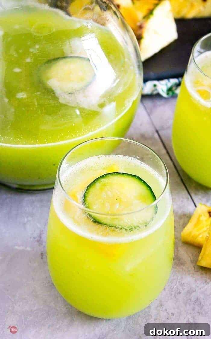 Pineapple Cucumber Rum Punch Recipe for Refreshing Summer Cocktails 8 overhead picture of pineapple cucumber rum punch
