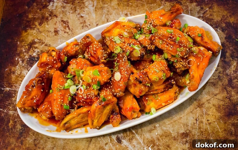 Sticky Honey Sriracha Wings | Savorwithjennifer.com