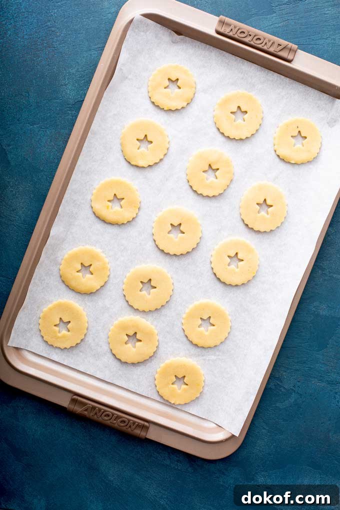Classic Linzer Cookies Recipe: How to Make Austrian Jam Sandwich Cookies 10 Unbaked cookies on a sheet pan