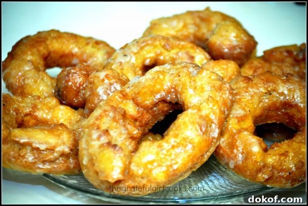 Glazed Pumpkin Buttermilk Doughnuts are done cooking, are glazed, and ready to eat!
