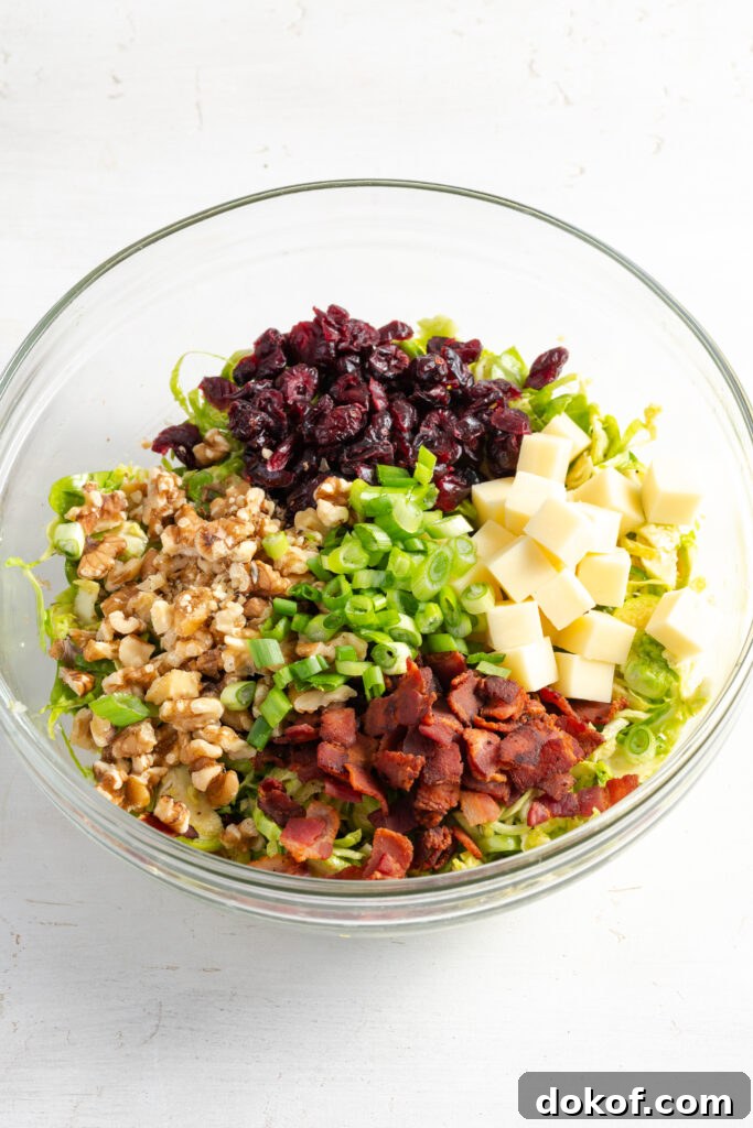 Citrus-Shaved Brussels Sprout Salad with Toasted Almonds 9 shaved brussel sprouts salad before tossing.