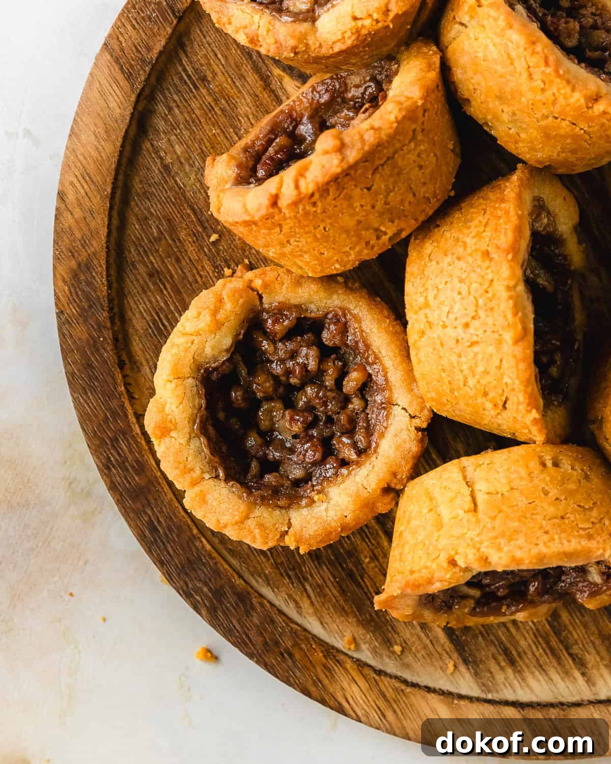 Pecan pie cookies are deliciously soft and buttery brown sugar cookie cups filled with a classic pecan pie filling.