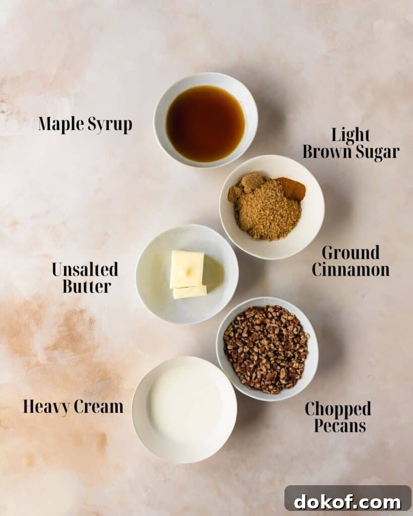 Pecan Pie Filling ingredients: butter, light brown sugar, maple syrup, heavy cream, cinnamon, and pecans.
