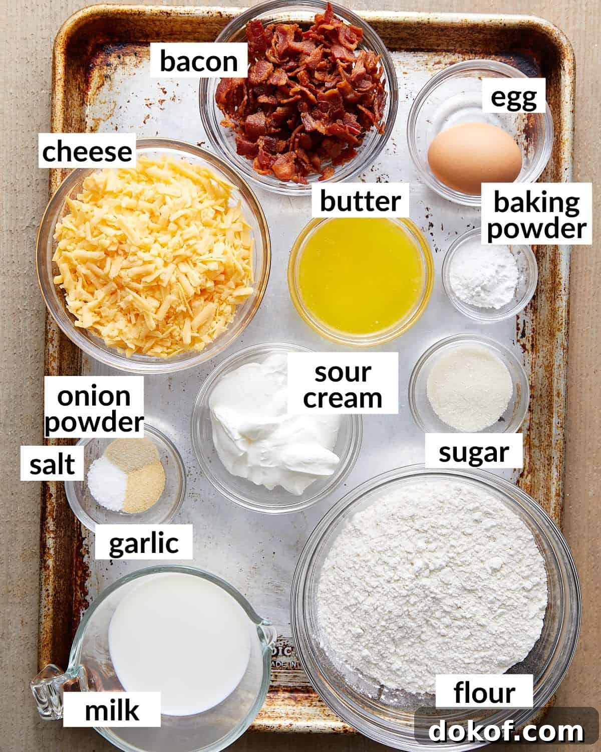 Overhead image of ingredients needed for bacon and cheddar cheese muffins.