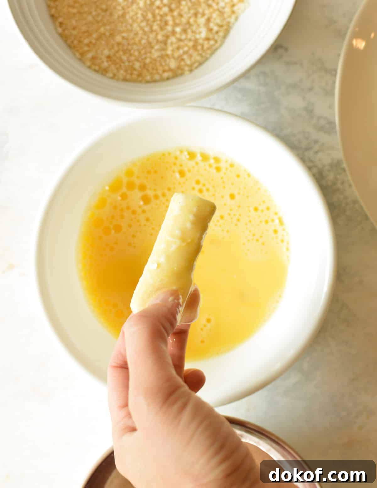 a cheese stick covered in egg 