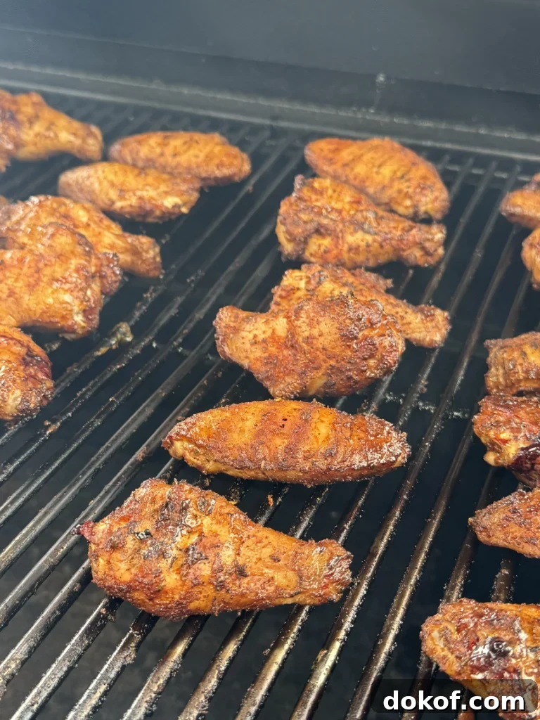 grilled smoked wings on a the grill grates