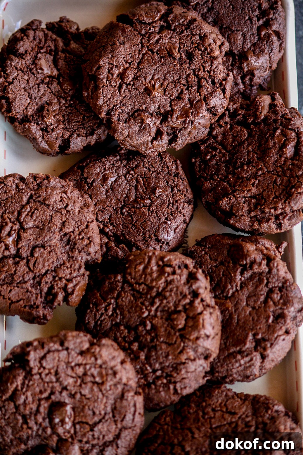 Rich, fudgy triple chocolate cookies with crisp edges and soft centers