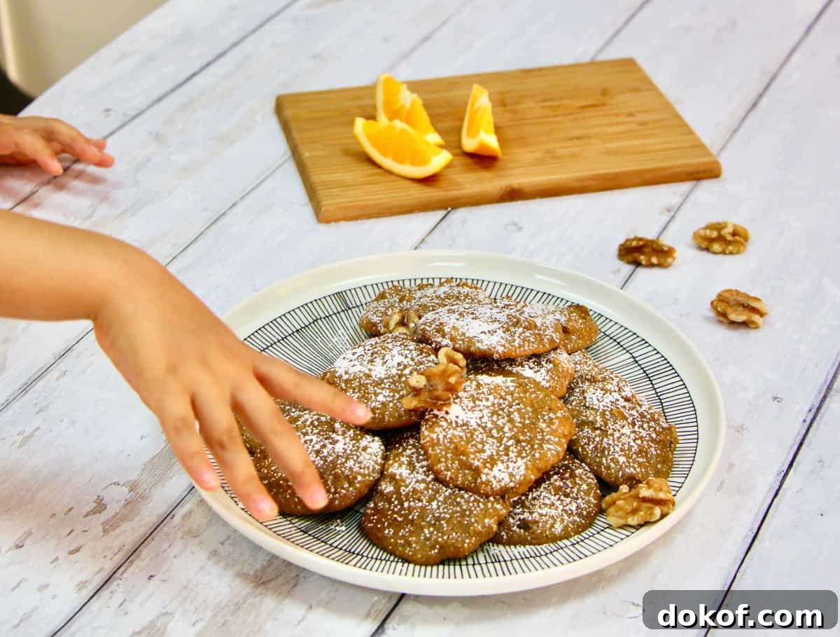 Photo of my daughter stealing a cookie from the photo shoot!