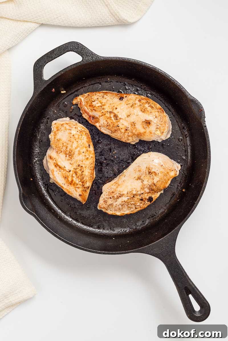 Cooking the chicken.