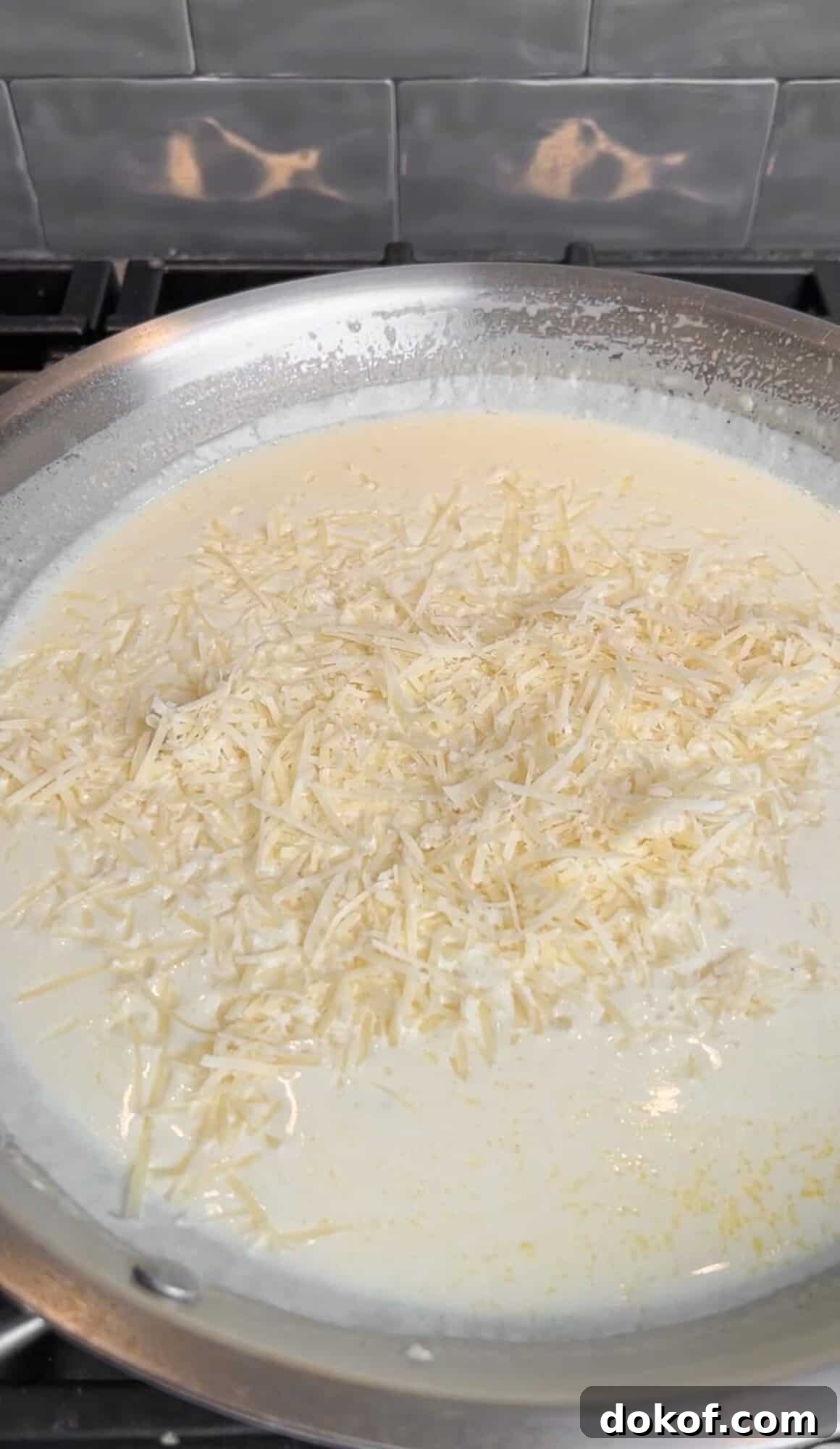 Parmesan is added to creamy lemon pasta