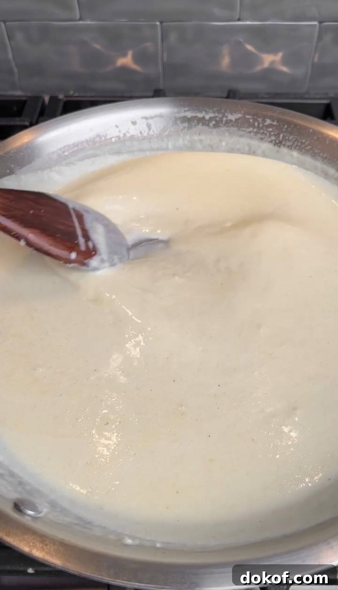 thickening the creamy lemon pasta sauce