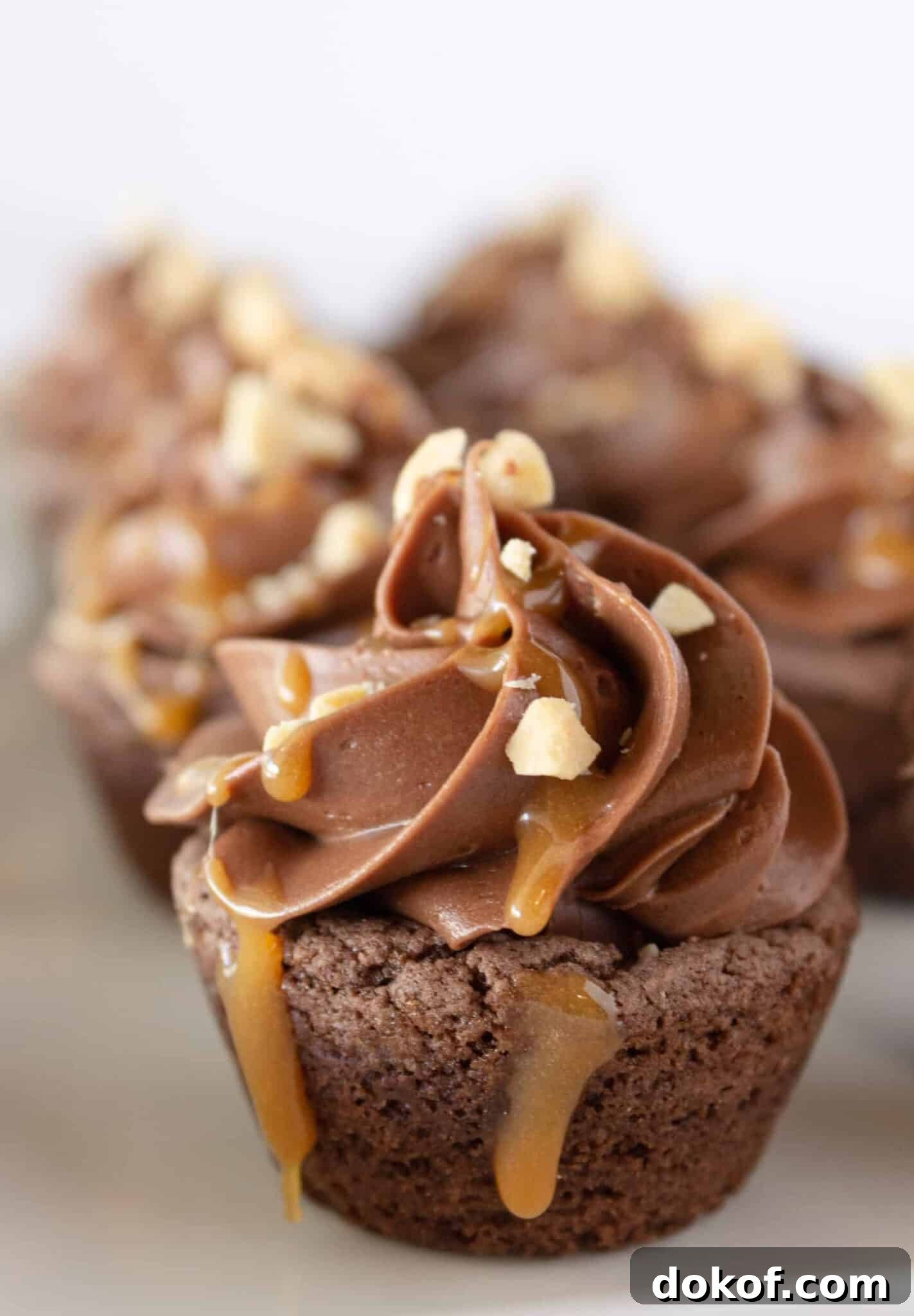 Chocolate Cake Mix Cookies: 12 Irresistible Recipes You’ll Love 12 Snickers cookie cups with caramel sauce.