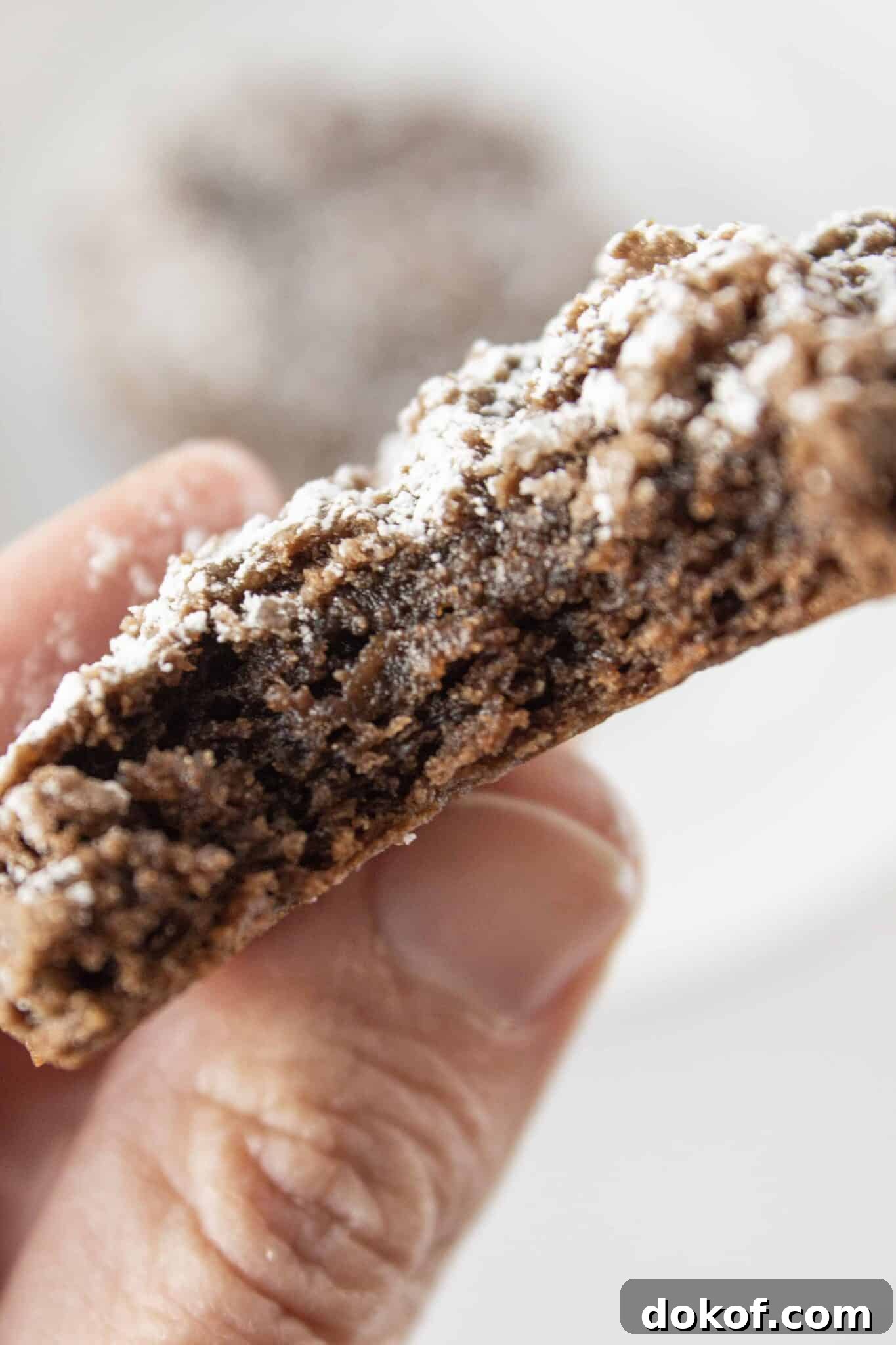 Chocolate Cake Mix Cookies: 12 Irresistible Recipes You’ll Love 16 A cream cheese chocolate cookie with a bite taken from it.