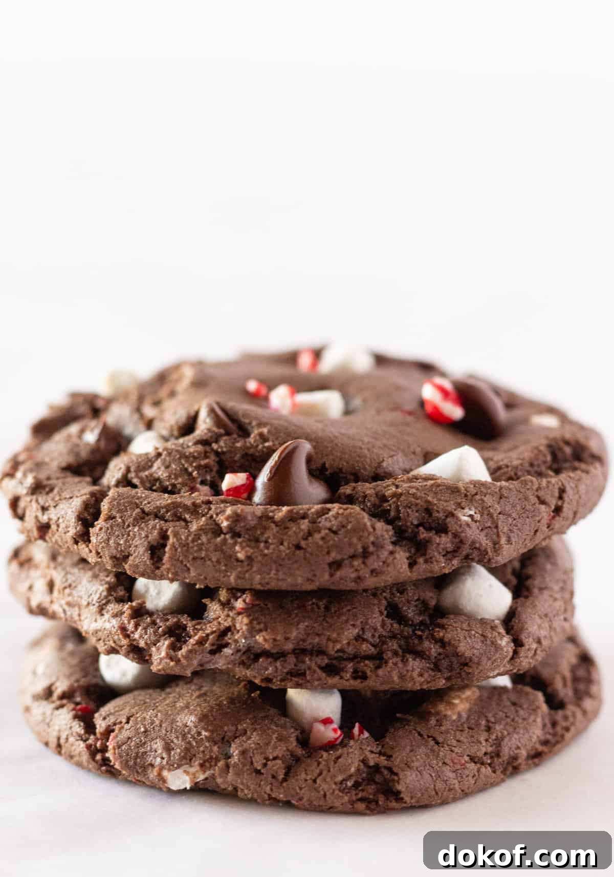 Chocolate Cake Mix Cookies: 12 Irresistible Recipes You’ll Love 20 Hot cocoa peppermint cookies stacked up.