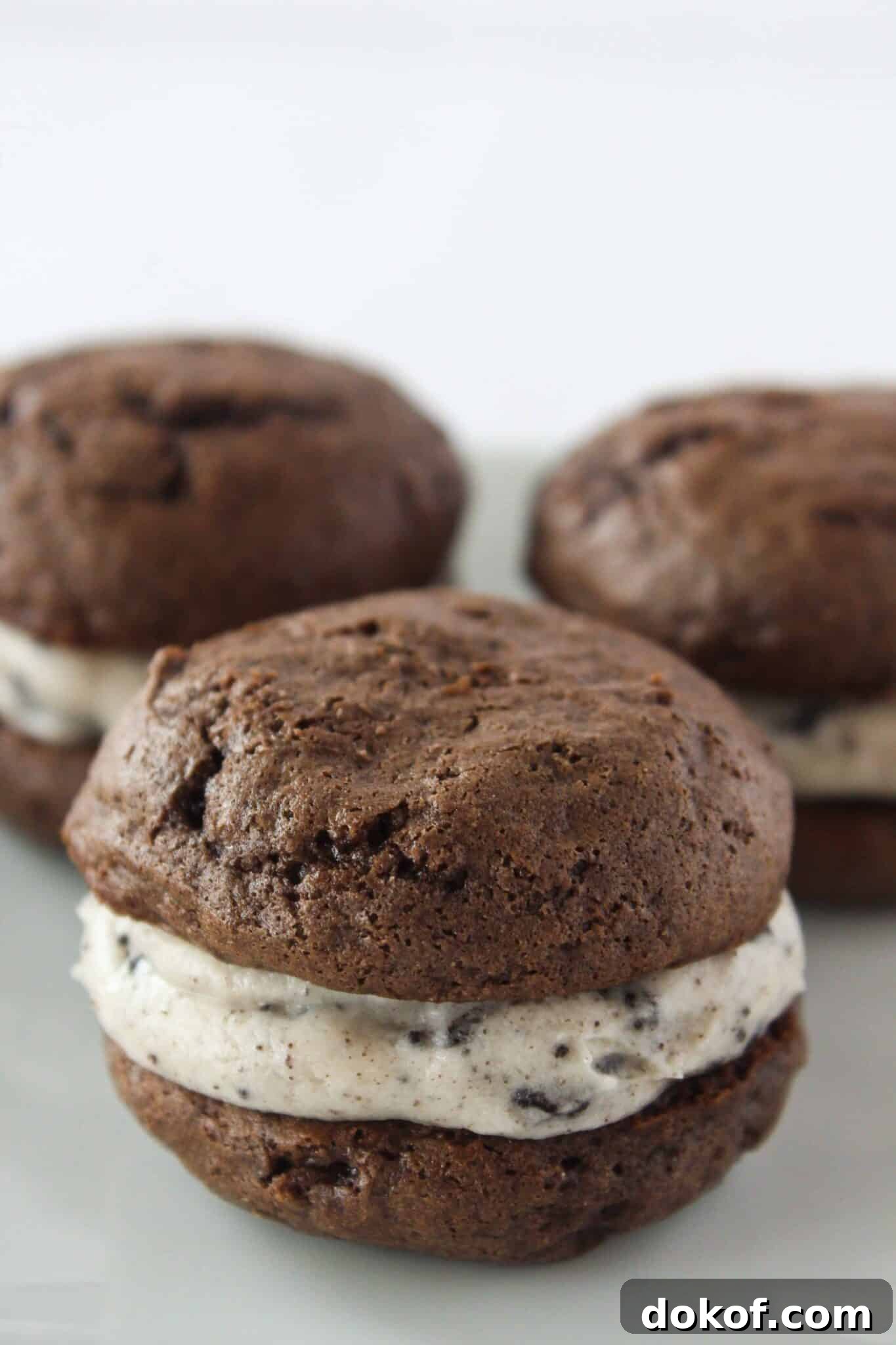 Chocolate Cake Mix Cookies: 12 Irresistible Recipes You’ll Love 3 3 easy oreo whoopies pies on a white plate.