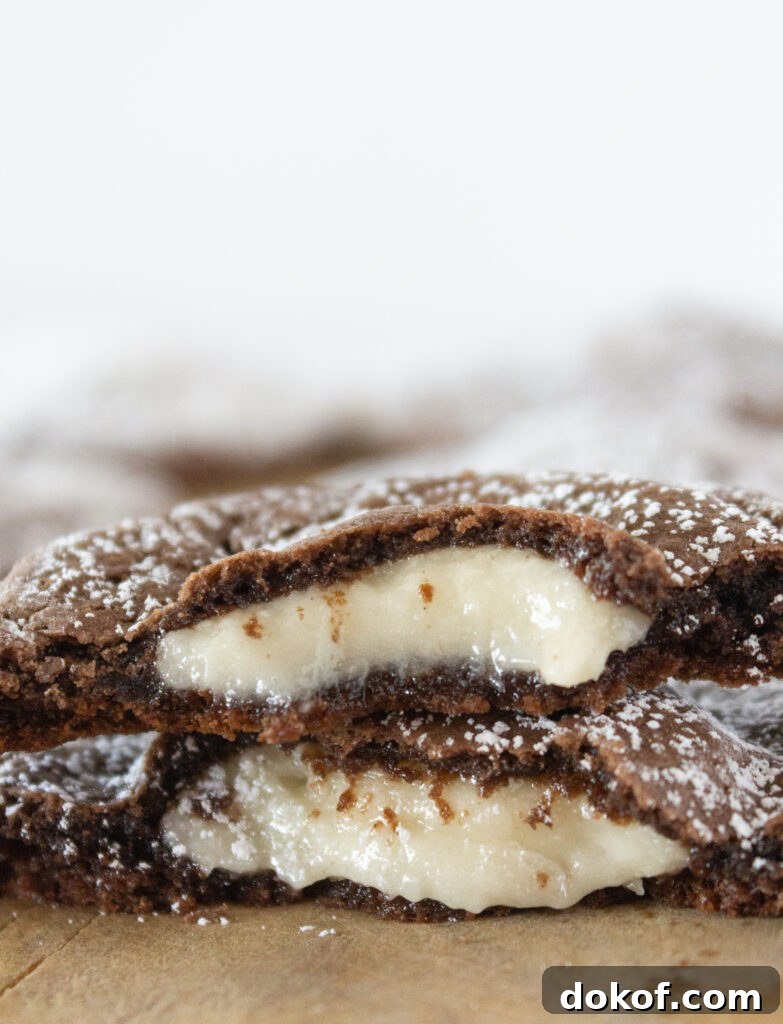 Chocolate Cake Mix Cookies: 12 Irresistible Recipes You’ll Love 22 Chocolate cake mix cookie stuffed with cream cheese frosting.
